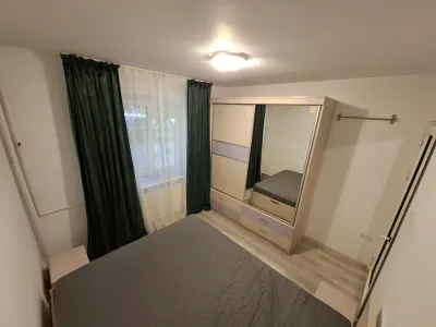 dormitor pat si dulap inchiriere apartament Sector 1 București
